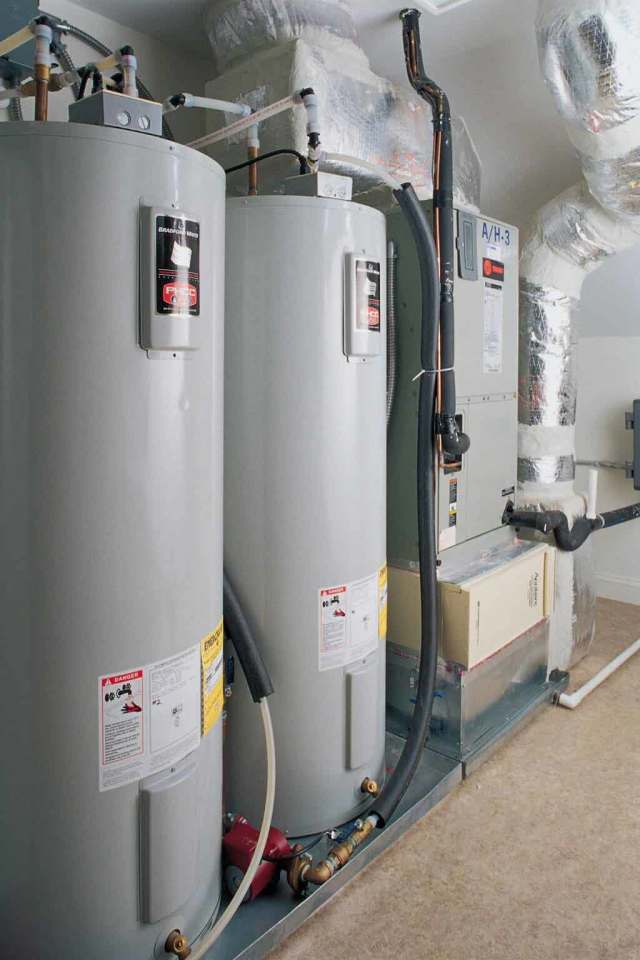 A bunch of water heaters in a room